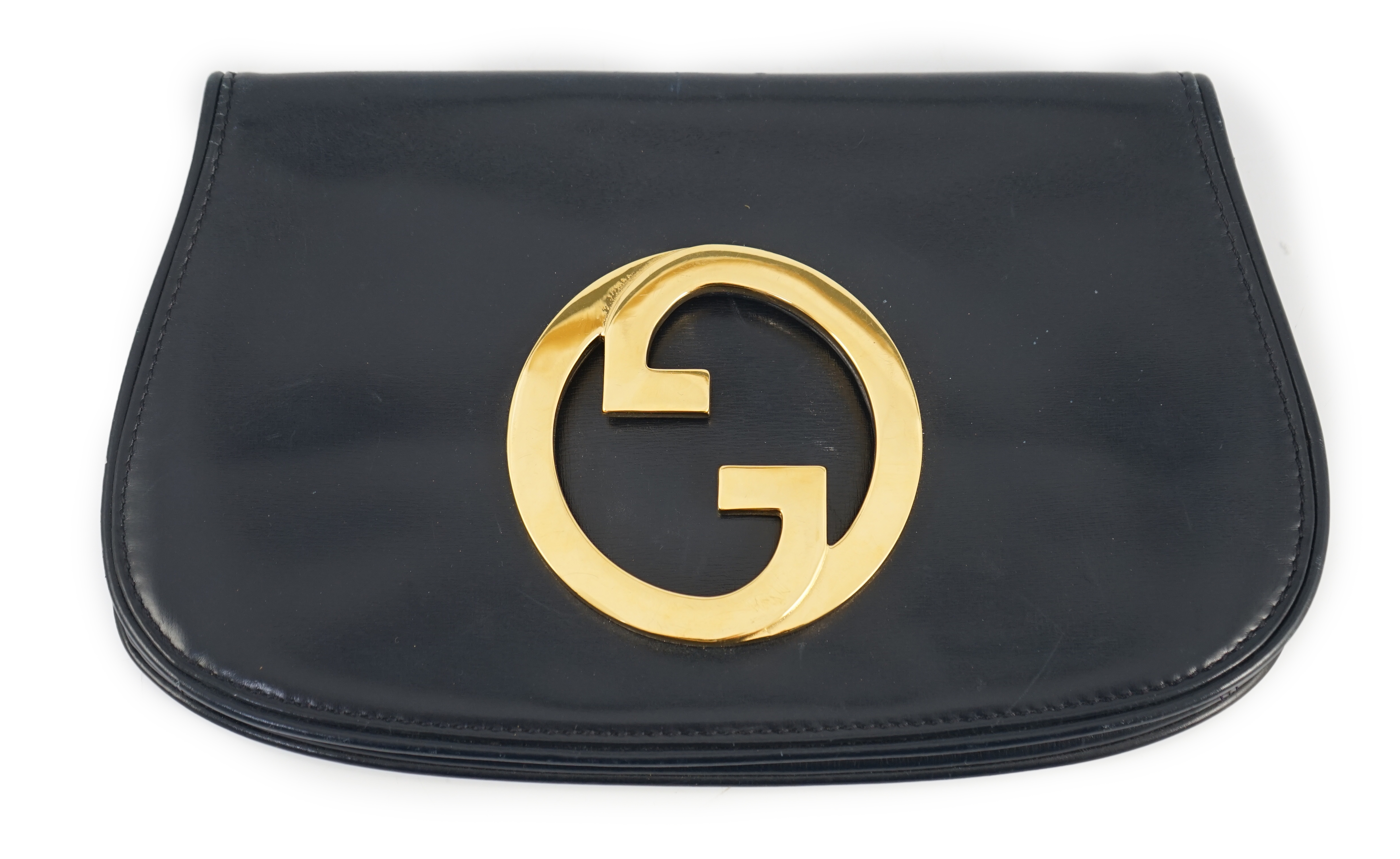 A vintage Gucci Blondie Unicorn navy leather clutch bag, width 28cm, depth 4cm, height 16cm